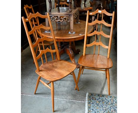 A set of four mid-century Ercol (496) 'batwing' design elm dining chairs (4)One chair has minor scuff to seat, another shows 