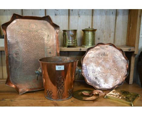 An Arts &amp; Crafts copper and brass tobacco jar and cover in the Jugendstil manner, with enamel bosses, 11 cm high, to/w a 