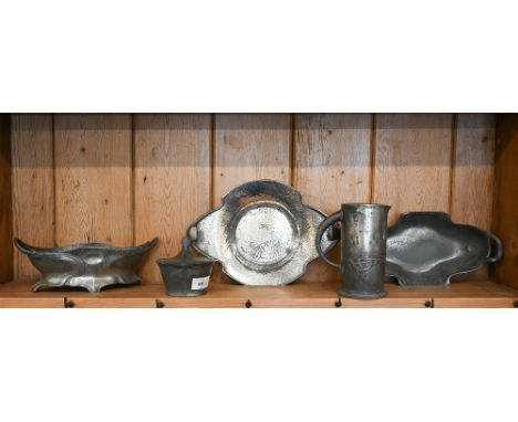 An Art Nouveau BCM/Tudric hammered dish, no. 01497, 30 x 21 cm to/w a Tudric Art Nouveau jug embossed with stylised foliage n