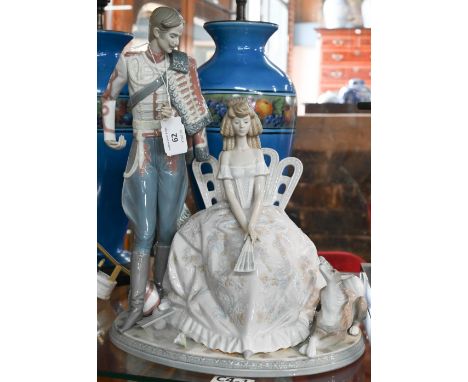 A boxed Lladro group 'A Flower for My Lady' 1513, signedRe-glued plume on Shako, which itself is detached from male figure's 