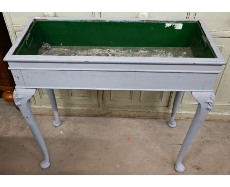 A grey painted tin-lined jardiniere planter standing on carved cabriole legs, 84 cm x 38 cm x 76 cm h