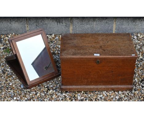 A small antique teak campaign trunk with brass carrying handles, 57 cm x 35 cm x 39 cm h to/with a mahogany cased folding cam