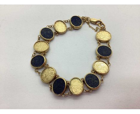 A 9ct Gold Hardstone Inlaid Panel Bracelet, the oval collet set hardstones, alternately set to decorative scrolling panels an