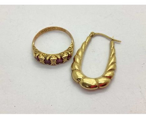 An 18ct Gold Four Stone Ring, alternately set with chip spacers with scroll caved style setting, Birmingham 1912 (finger size