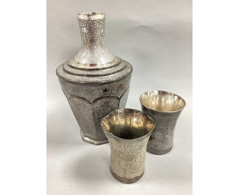 Decorative Far Eastern Carafe, possibly Malaysian, of tapering octagonal form, allover profusely detailed with floral sprays,