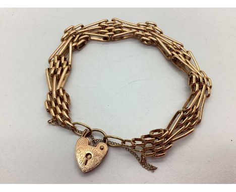 A 9ct Rose Gold Gate Link Bracelet of Panel Design, to decorative heart padlock and safety chain (20grams).