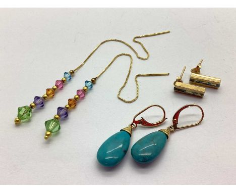 A Pair of 9ct Gold Graduated Drop Earrings, with beaded spacers and chain connections, a pair of 9ct gold line set ear studs,