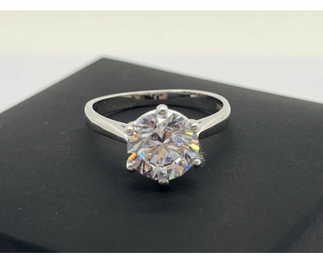 Gold Boutique; A Modern Single Stone Dress Ring, six claw set, stamped "375" "10K CG" (finger size L) (2.7grams), in original