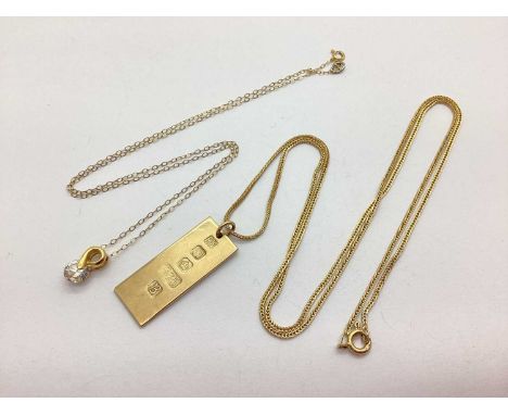 A 9ct Gold Ingot Pendant, Sheffield 1976, suspended on a curb link chain stamped "9ct", a dainty fine link chain stamped "9kt