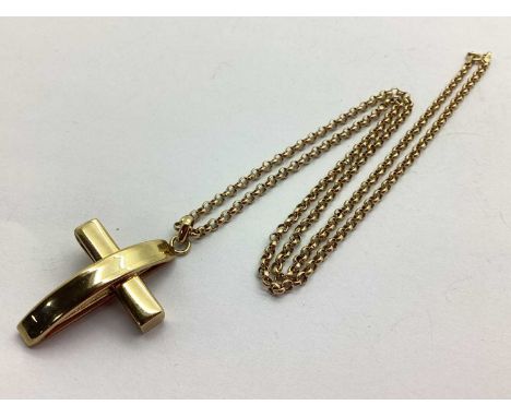  A 9ct Gold Modernist Style Cross Pedant, suspended on a dainty belcher link chain (7.1grams).The chain is 51.5cm open length