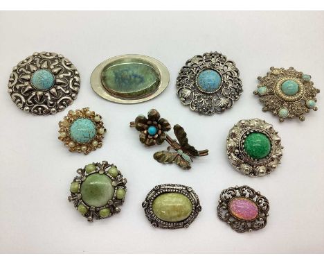An Assortment of Decorative Brooches, to include Peking glass set, enamel inlaid Arts &amp; Crafts style, imitation pearl bea