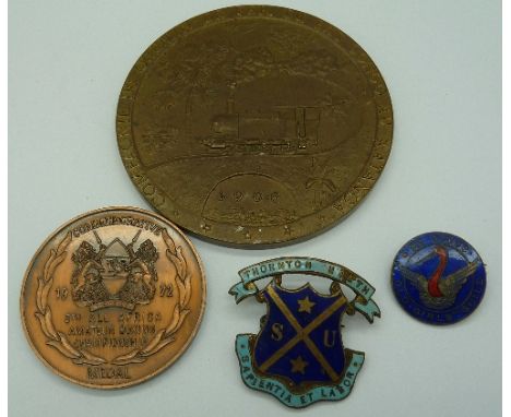 An enamel Old Girls Guild badge, a large commemorative railway medallion, etc.