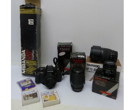 A Centon DF-300 camera, Tamron AF70-300mm lens, a Centon 50mm lens, a Centon 70-210mm lens, flash gun, tripod, etc.