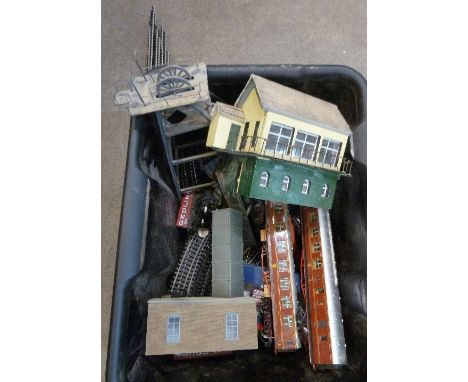 A collection of 00 gauge model rail including track, transformer and controller, tank engine, multi-point charger, track plie