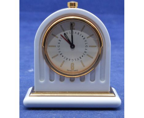 Bulgari miniature white enamel alarm clock, with baton and arabic dial.