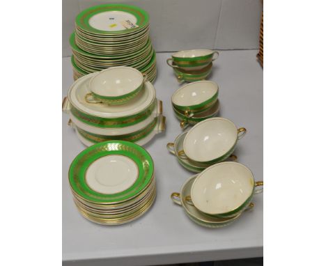 A green and gilt decorated Palissy ware soup and dinner set, to include: soup bowls and saucers; tureens; side plates; and di