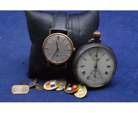 A 9ct yellow gold cased wristwatch by Reid; a pair of 9ct yellow gold cufflinks with engraved initials and enamel flag; anoth