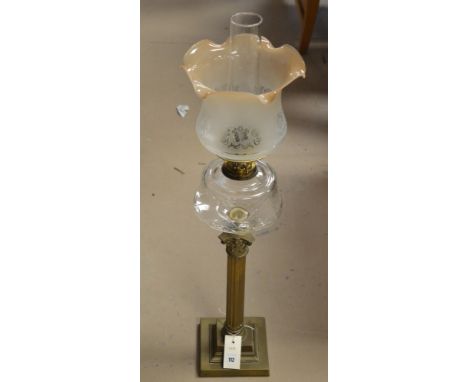 A cut glass tall corinthian column duplex oil lamp and shade, 78cms high.