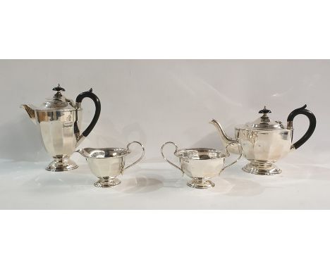 George V silver four-piece tea service to include teapot, hot water pot, cream jug and sugar basin, of octagonal panelled for