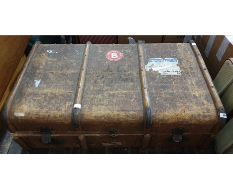 Canvas and wood banded vintage trunk, bearing label ( torn) Cunard White Star to Europe, and Cunard White Star First Class RM