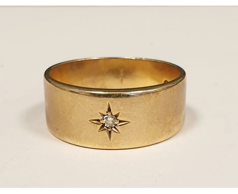 Gent's 9ct gold and diamond ring set small diamond in plain band, 9.2g approx 