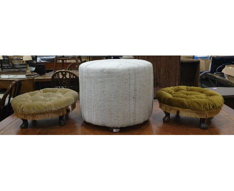 Cylindrical foot pouffe by Forge House Interiors together with two low foot pouffes with button upholstered top raised on cab