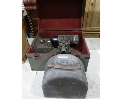 Bell and Howell Gaumont&nbsp; projector within original case, along with slide projector Eumig P-8 Automatic Slide Projector,