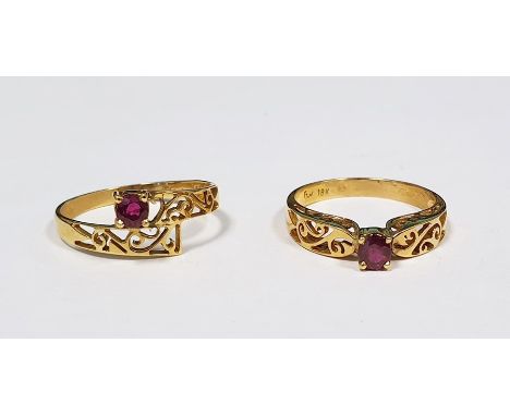 Two 18ct gold and ruby rings, each set single stone in pierced setting (2) Condition ReportThe weight of the rings (from phot