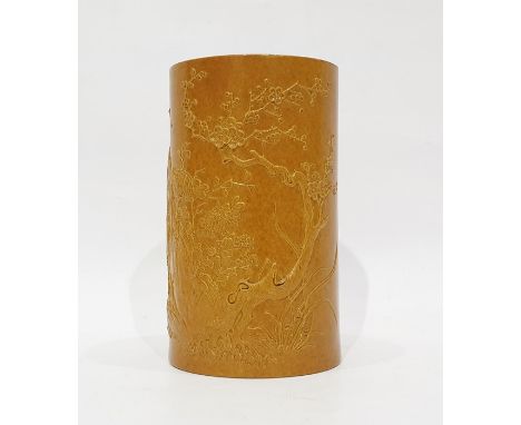 19th century Chinese porcelain bamboo-pattern brush pot, cylindrical and embossed with flowering prunus tree, bamboo and chry