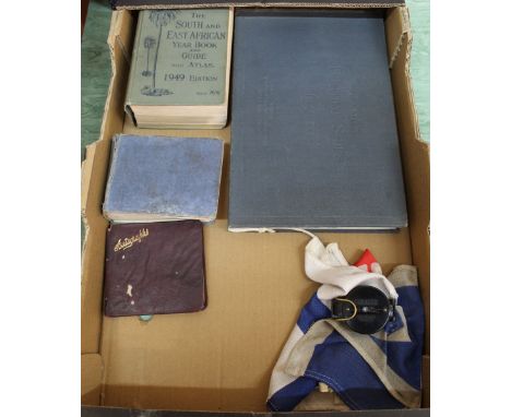 A mixed lot including a pocket book titled The Royal Air Force with other titles, compass etc