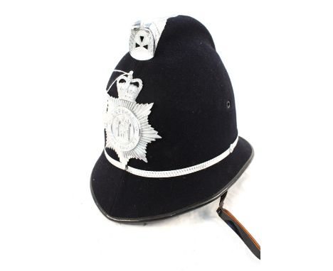 A Police helmet bearing Suffolk Constabulary insignia plate