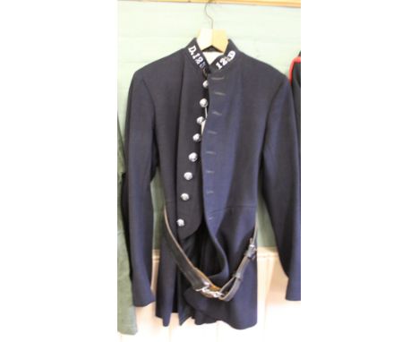 A vintage Police tunic with Metropolitan Police insignia complete with leather 'snake' fastening belt