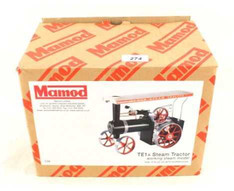 A boxed Mamod TE1A steam tractor