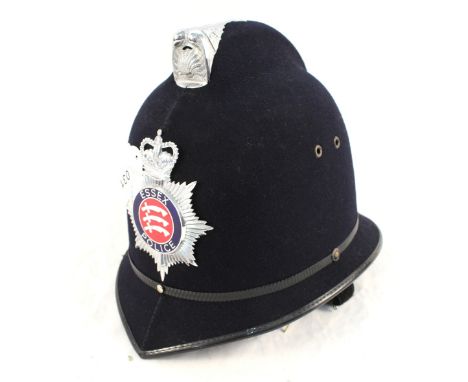 A Police helmet bearing Essex Police insignia plate