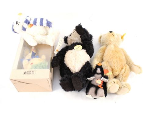 A boxed Steiff Rolly Polly rabbit, unboxed 028205 Winter 18 bear, a brown mohair bear, panda and mole