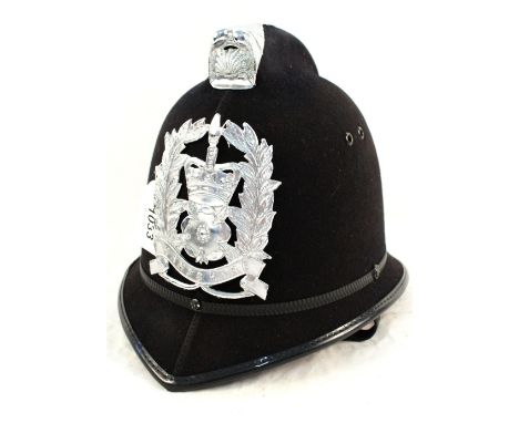 A Police helmet bearing Hampshire insignia plate