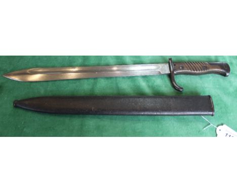 A German model 98/05 'butchers bayonet' 2nd type complete with scabbard, blade marked Alex Coppel Solingen, in overall good c