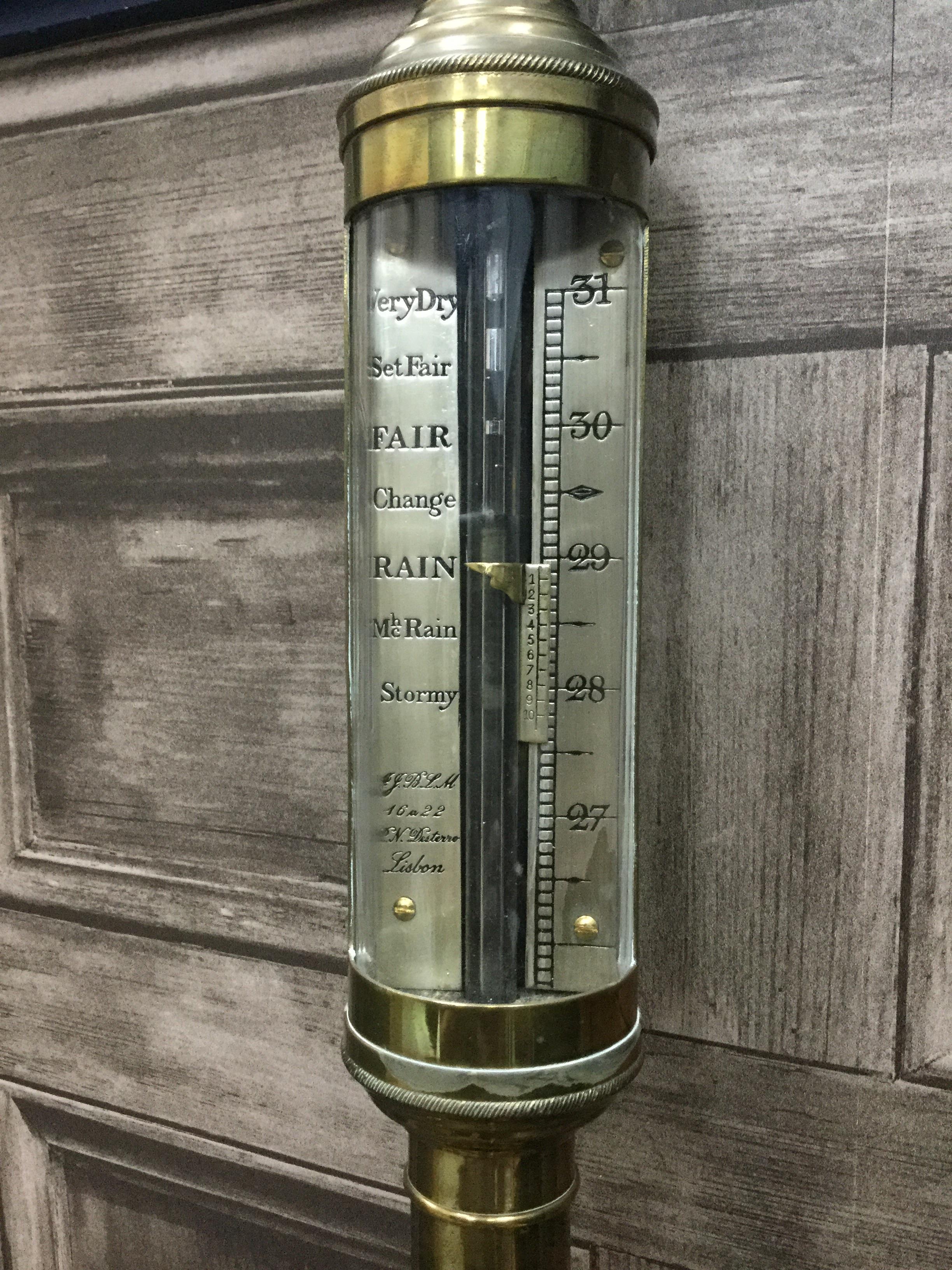 PORTUGUESE BRASS SHIP'S STICK BAROMETER, the silvered dial inscribed