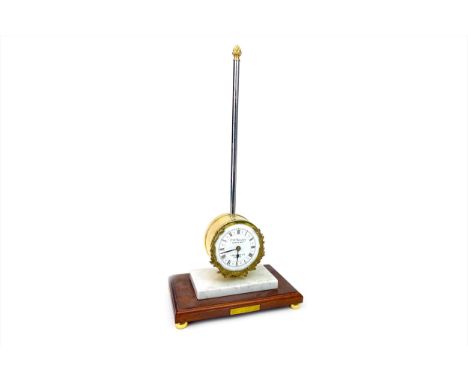 REPRODUCTION RACK CLOCK BY T.W. BAZELEY, the white enamel dial with Roman numerals, brass drumhead with cast wreath surround,