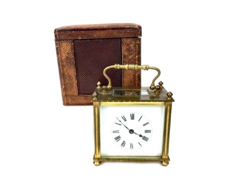 EARLY 20TH CENTURY CARRIAGE CLOCK, with one train movement, the white enamel dial with Roman numerals, brass five glass case,