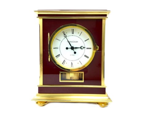 JAEGER LECOULTRE 'ATMOS' ROYALE MANTEL CLOCK, the white enamel dial with Roman numerals, contained in a claret and gilt metal