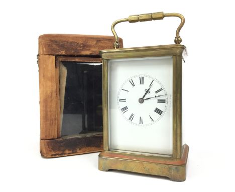 EARLY 20TH CENTURY FRENCH CARRIAGE CLOCK, with two train eight day movement, contained in a brass five glass case, with swing