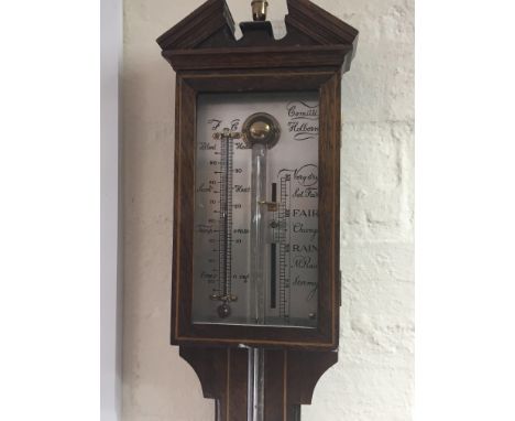 A 20th Century inlaid Mahogany stick barometer.