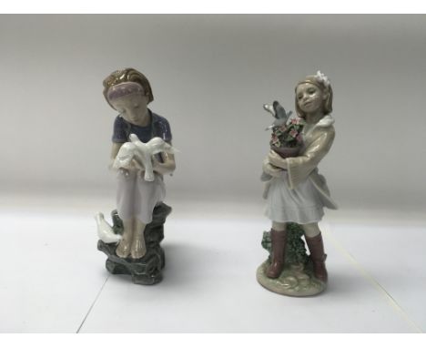 A pair of Lladro figures to include No. 8536 “Playing with doves” and No. 8362 “Morning melodies”