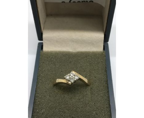 An 18ct gold and diamond set ring. Approx size K