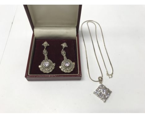 A 925 silver marcasite necklace and pair of amethyst earrings. Weight approx 19.5g