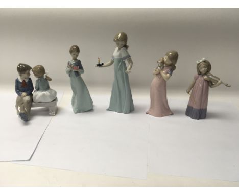 A collection of five Nao figures including No. 1136 “First love” and No. 1304 “Girl with violin”