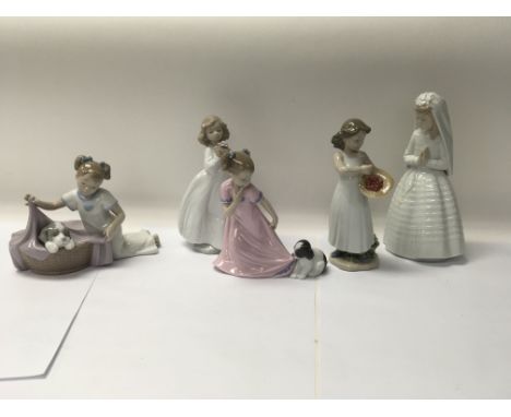 A collection comprising of five Nao figures including “Its time to sleep” and “Strawberry Bonnet”