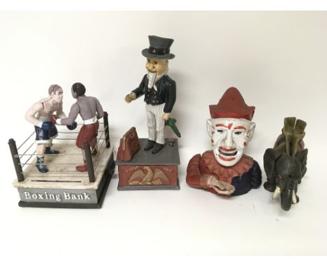 A box containing eight vintage cast iron money boxes including a Boxing Bank, an Uncle Sam, Show Jumper, Human Canon and othe