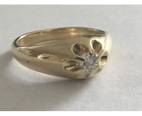 A Gents 18 carat gold ring set with a solitaire diamond approximately.20 of a carat. Ring size O-P.